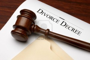 5774322-divorce-decree-gavel-and-folder-shot-on-warm-wooden-surface